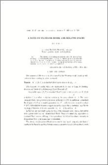 A note on standard Borel and related spaces