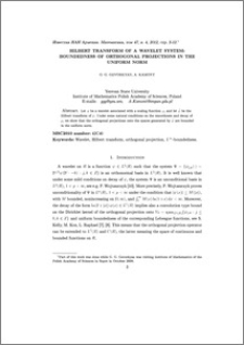 Hilbert transform of a wavelet system: boundedness of orthogonal projections in the uniform norm