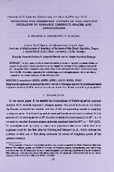Estimates for imaginary powers of the Laplace operator in variable Lebesgue spaces and applications