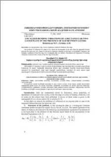 Localized bending vibrations of a rectangular two-layer plate in the presence of slip between layers