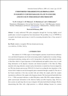 UNDISTORTED TERAHERTZ PULSE PROPAGATION IN SLIGHTLY CURVED PARALLEL PLATE WAVEGUIDE AND ITS USE IN TIME-DOMAIN SPECTROSCOPY