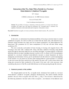 Interaction of the TE01 Mode With a Particle In a Two-layer Metal-dielectric Cylindrical Waveguide